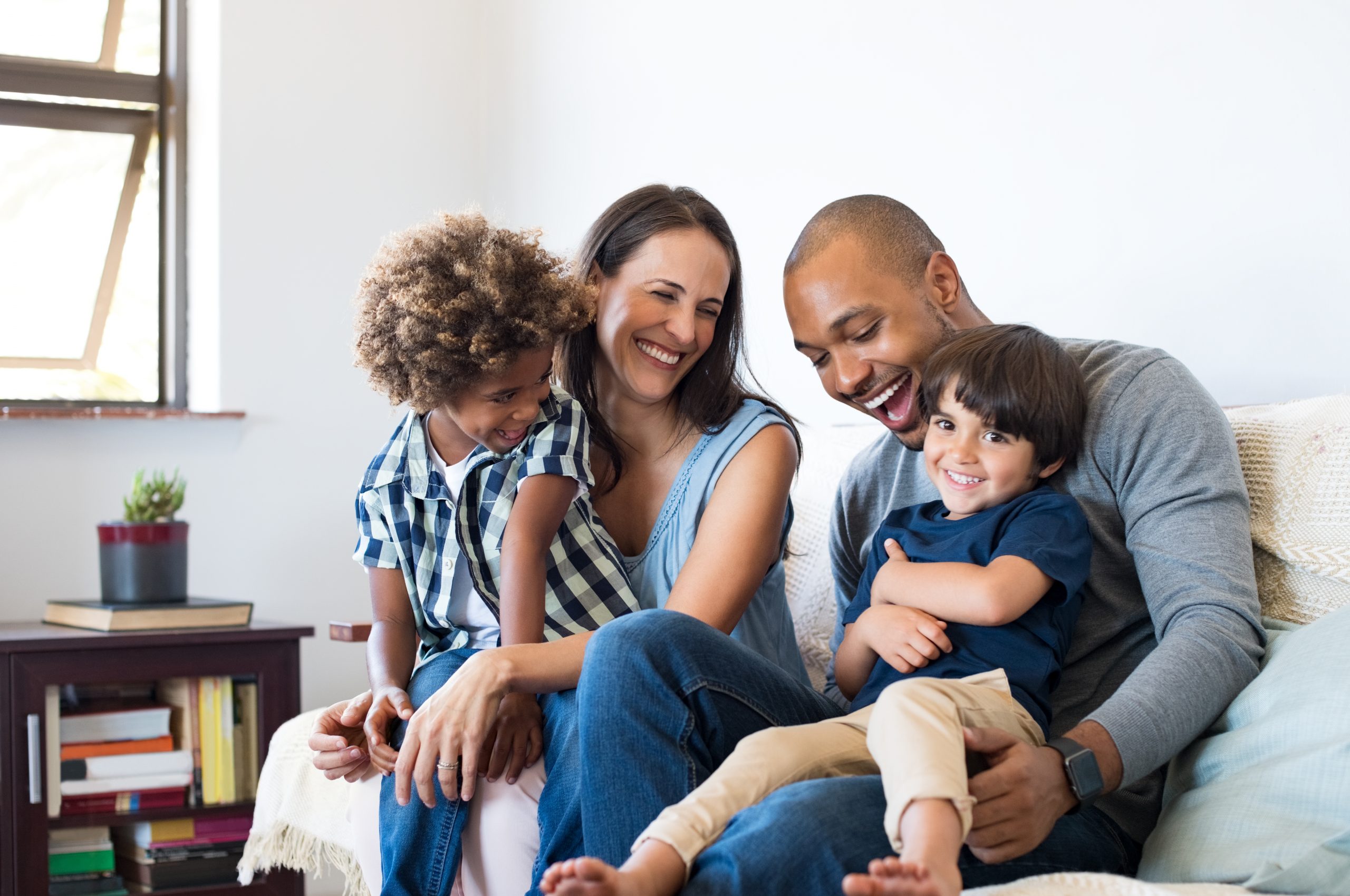 family at home on couch